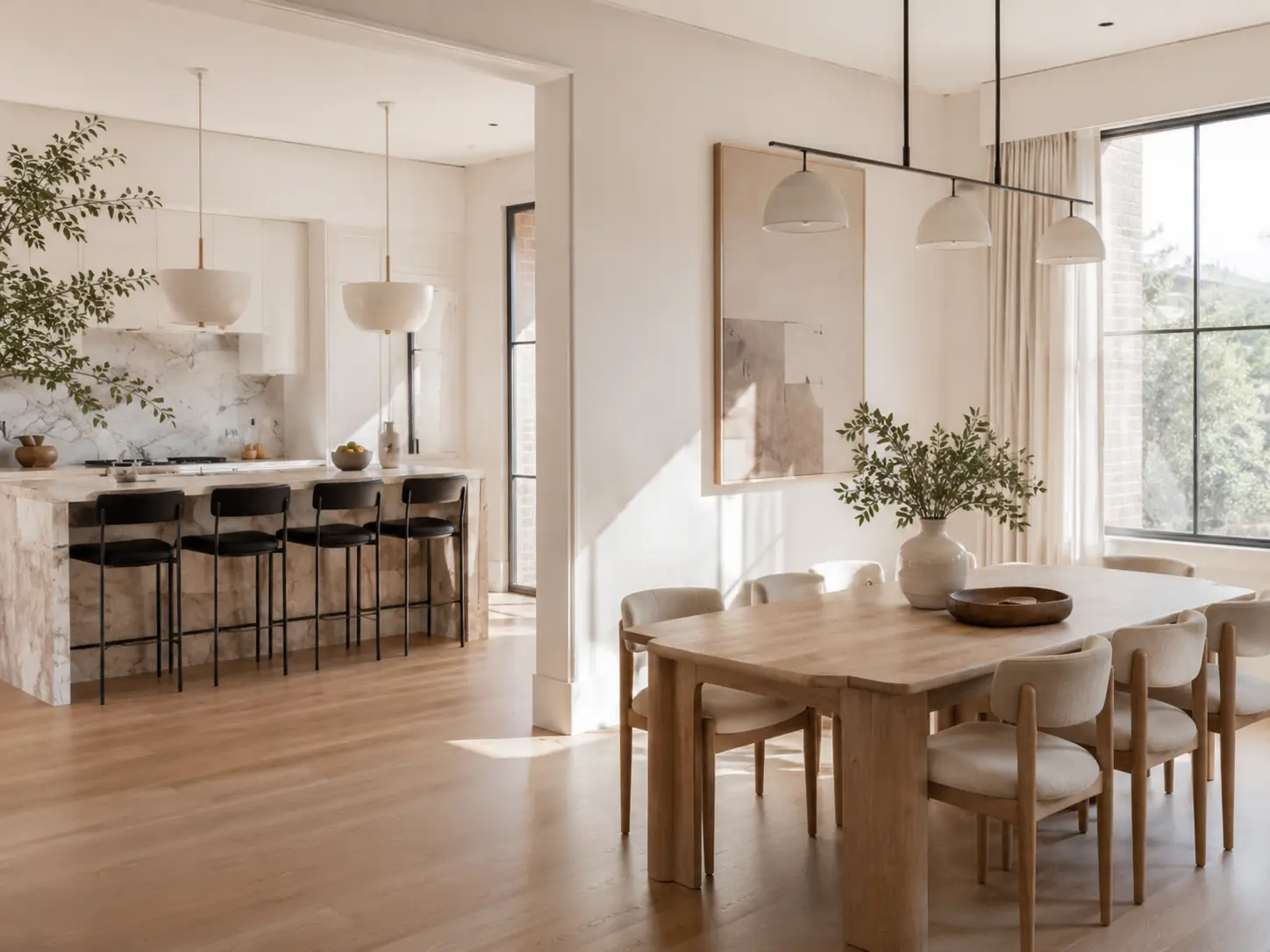 Salón-cocina y comedor de una vivienda en Madrid tras el cambio de uso de un local