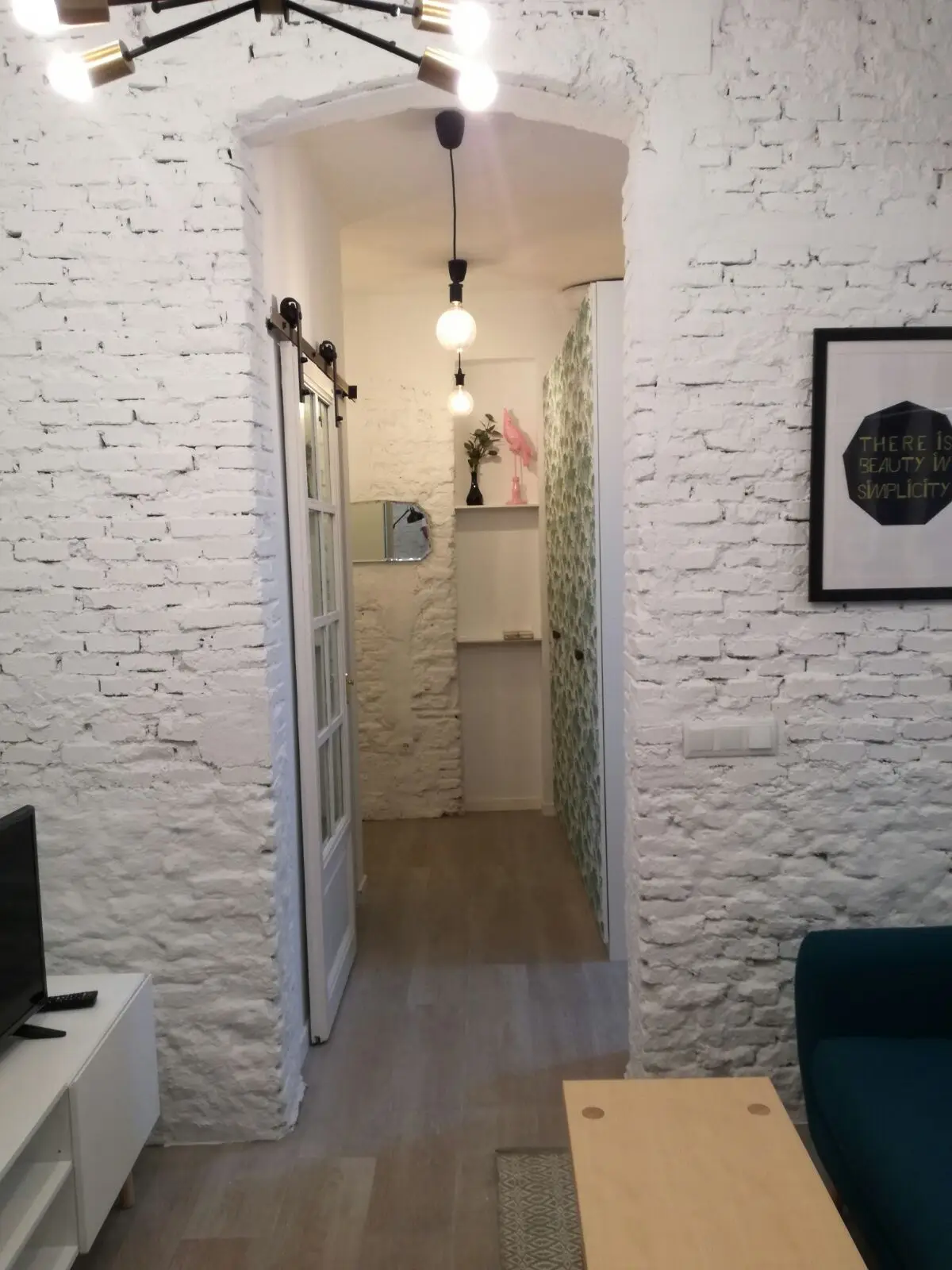 Una reforma de diseño en Lavapiés: distribución a medida en un piso interior